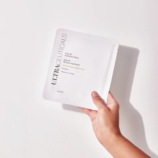 Two Ultraceuticals Ultra B2 Hydration Mask packages, one partially open, on a light surface. - K. Charles & Co. in Schertz, TX